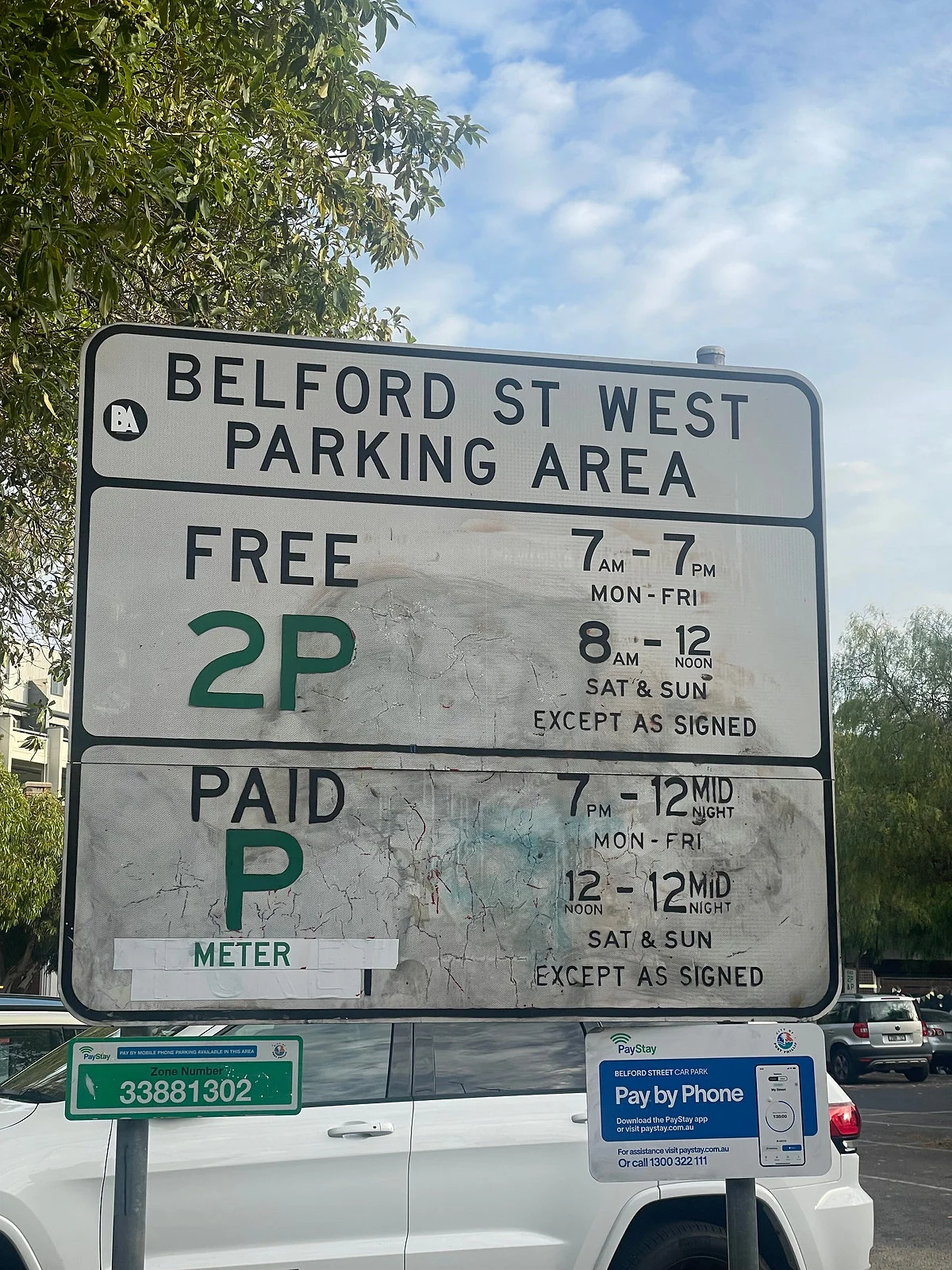 Belford Street West Parking Area sign — 30 seconds from Tiff Hair Salon